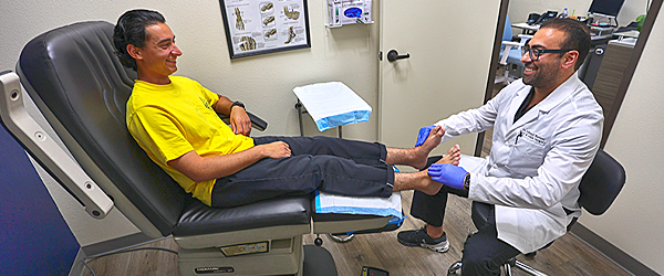 Dr. Bastani with Patient - Tustin Office